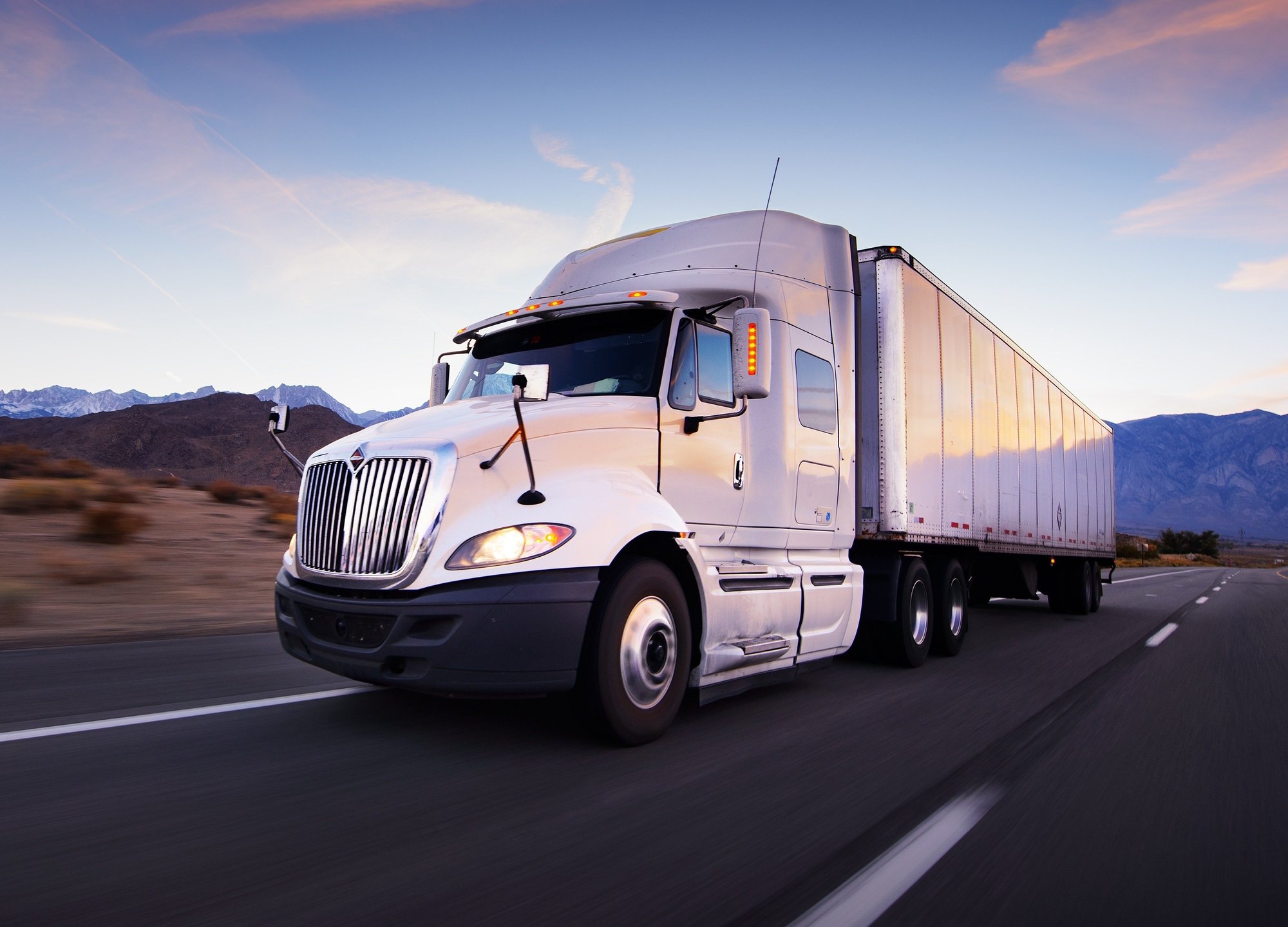Semi truck driving on the road
